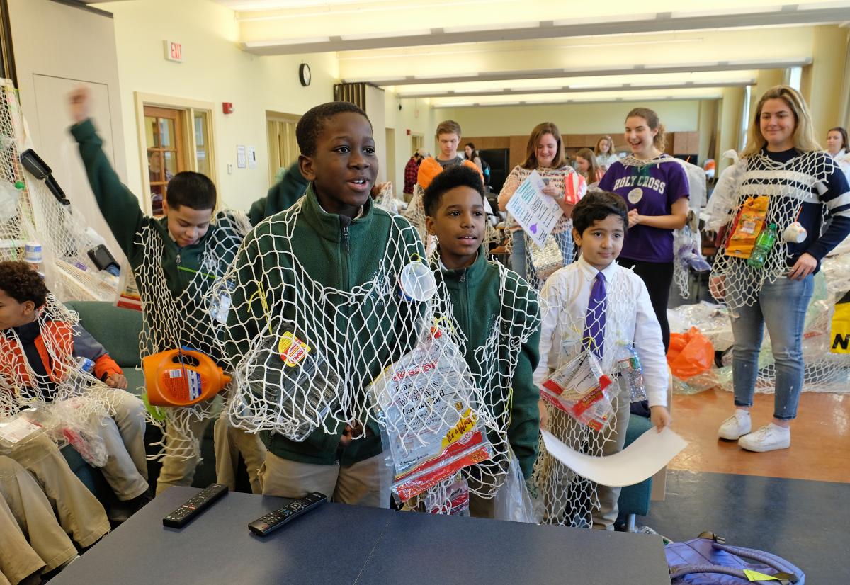 Nativity students making the trash dragon