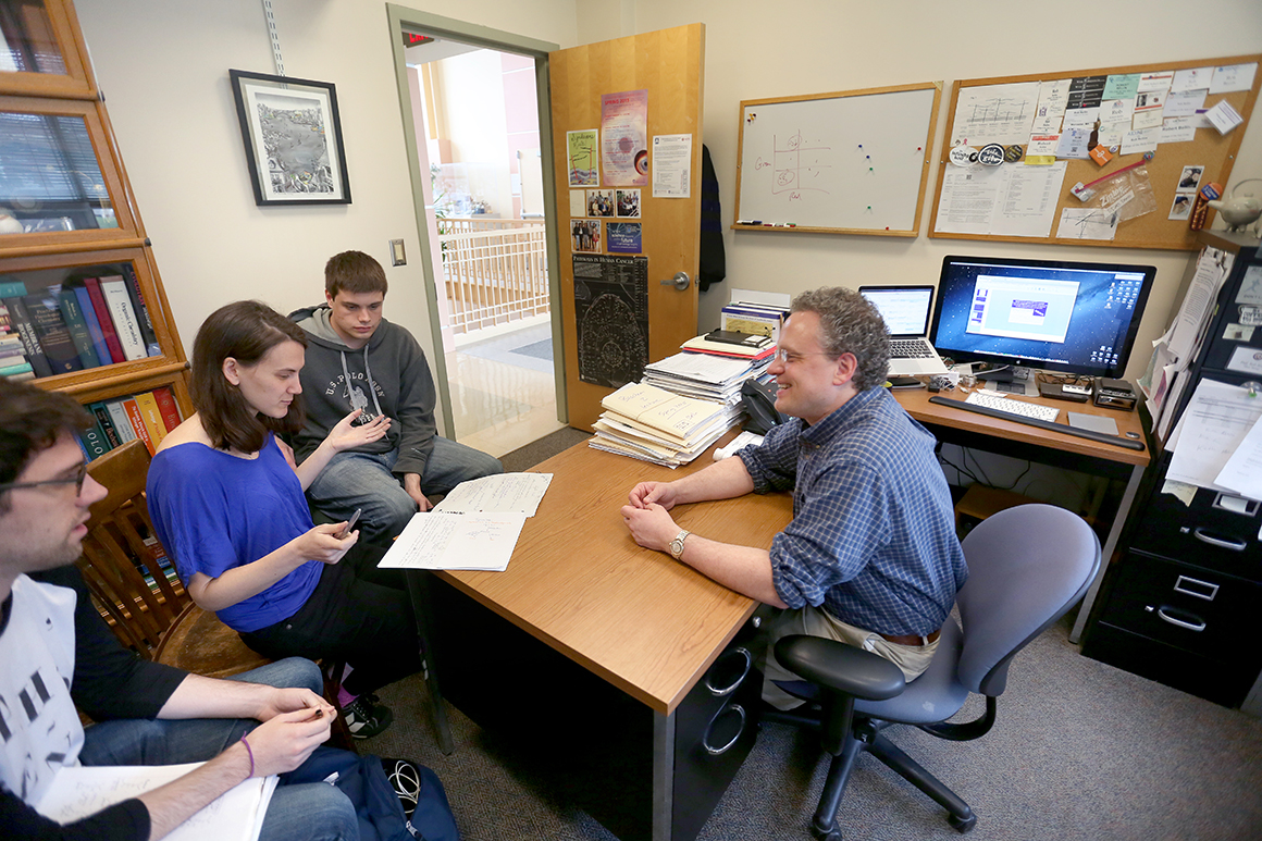 Rob Bellin, professor of biology, advises students.