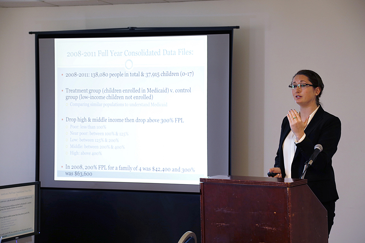 Jeanne Kiernan '14, an economics major in the health professions and College Honors programs, presents during the 2014 Academic Conference.