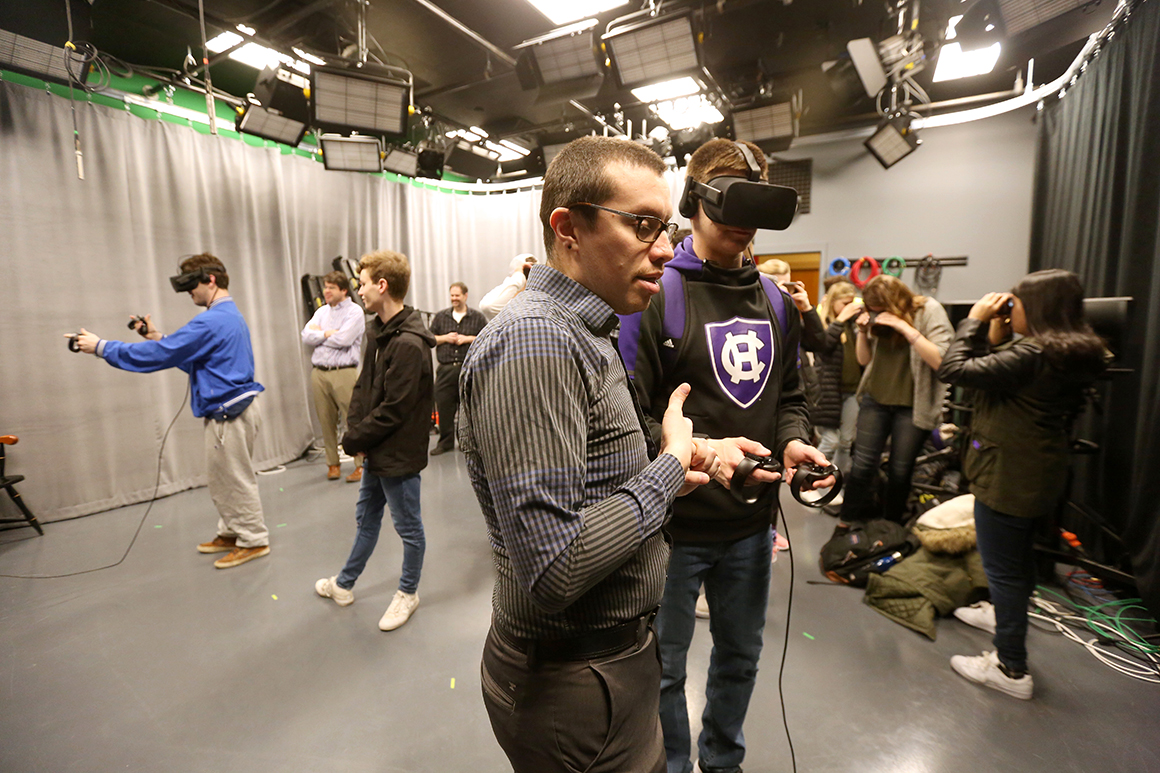 After reading an ethnography on Second Life, an online virtual world, students in Alvaro Jarrin’s Cyborg Self class, try out the Oculus Rift to experience virtual worlds. 