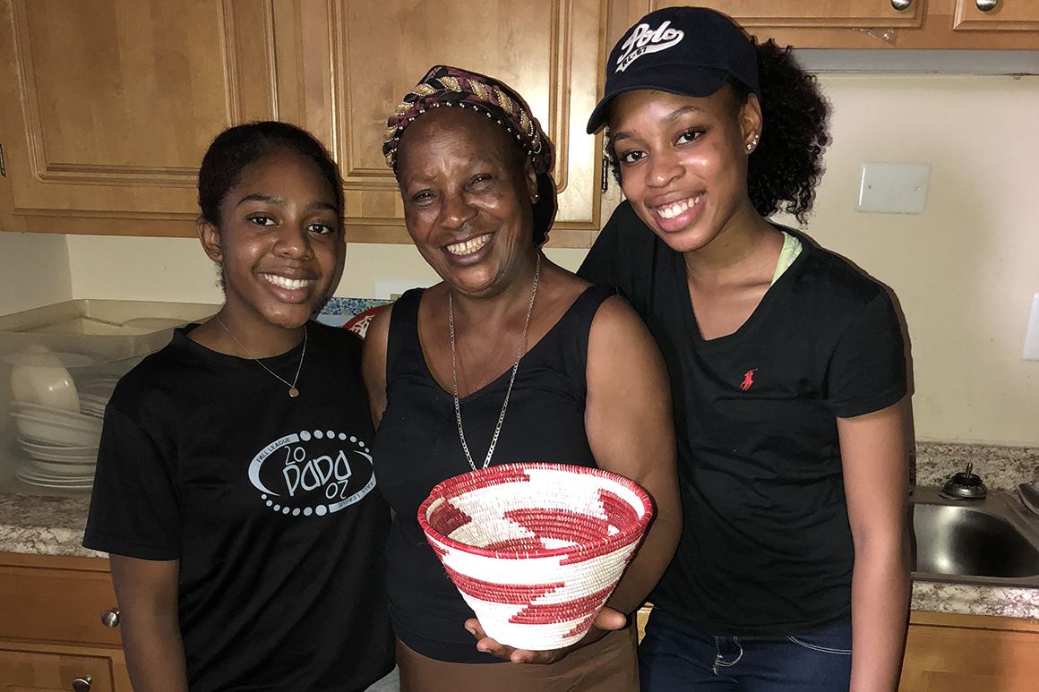 Students in Amanda Luyster's Introduction to Visual Arts class interview an artisan from Rwanda who has settled in Worcester. These interviews are conducted in cooperation with the local nonprofit RAW, Refugee Artisans of Worcester.