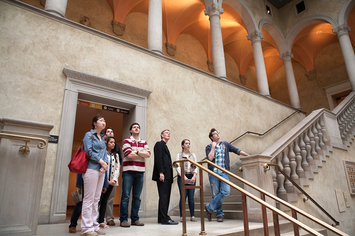 students at the top of stairs at the worcester art museum