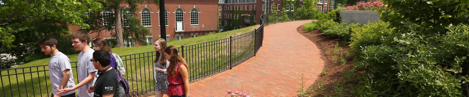 group of students walking across campus