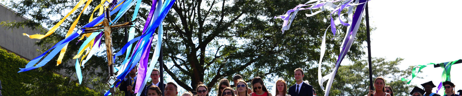 students outside with banners