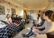 Six students sitting and chatting in Wheeler Hall