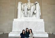 three people smiling