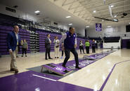 President Rougeau playing cornhole