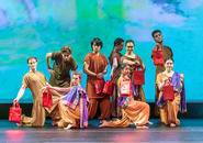 The company seduced by shopping show off their shopping bags.