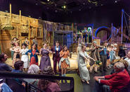 Scene from THE GOOD PERSON inviting audience to dance.