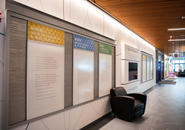 Bulleting board and sofa inside The Jo