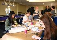 Students make puppets in Hogan