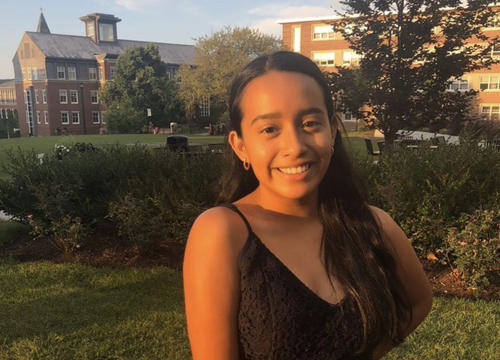 Bryceida Valencia '23 smiles on the Holy Cross campus.