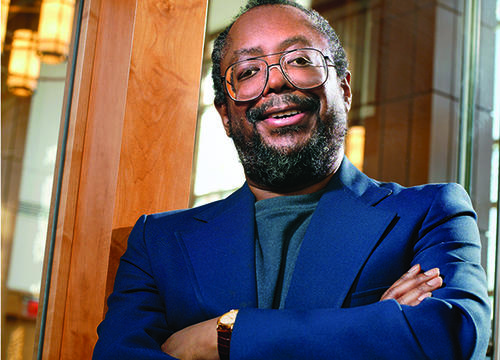 Edward P. Jones '72 is seen here outside Rehm Library on campus, where Jones returned in 2004 to give a reading and meet with students. Photo by Dan Vaillancourt