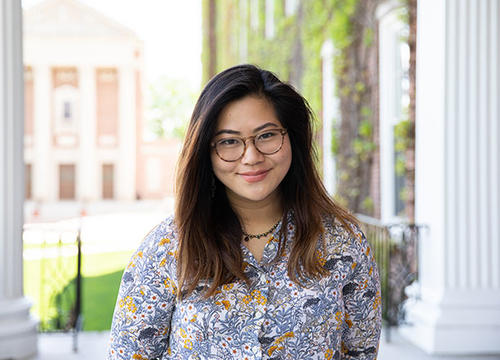 Mia Yee stands on Fenwick Porch