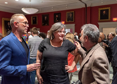 Stephanie Yuhl at the opening reception for "LGBTQ+ Worcester -- For the Record," the exhibition she helped bring to life at the Worcester Historical Museum.