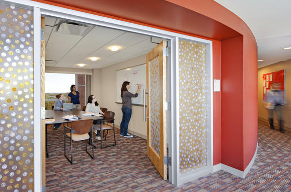 students gathered in a study room in Figge Hall