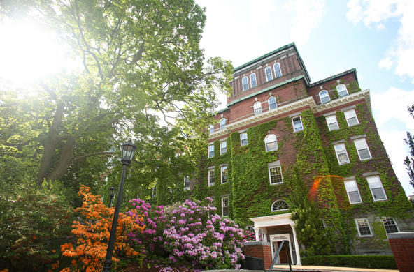 side of ivy-covered O'Kane Hall