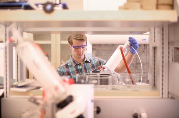 student conducting research in a science lab