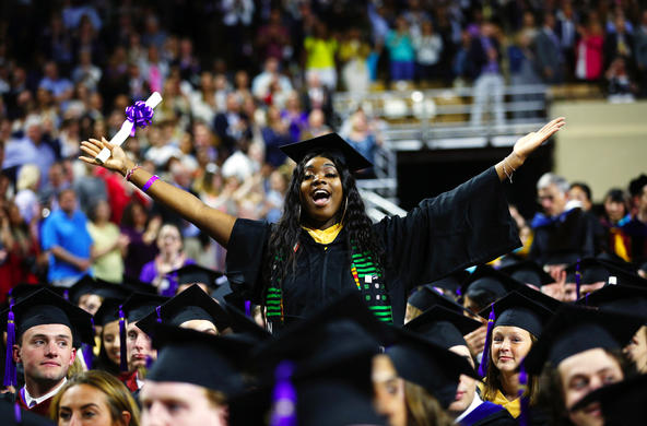 student celebrating at Commencement