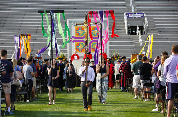 Students processing out during Mass of the Holy Spirit