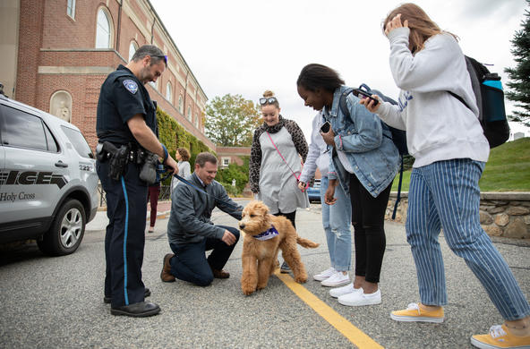 Public safety officer talking to students.