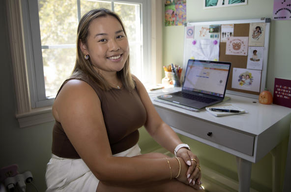 Grace Miller ’23 photographed at her home where she works remotely as a Learning and Evaluation Fellow for Project Hope 