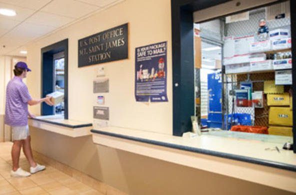 student at post office