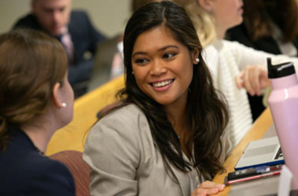 a student sitting and talking
