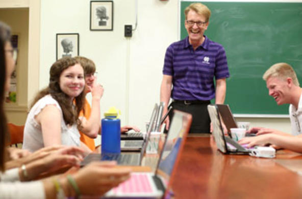 professor in a classroom with students