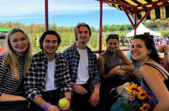 Foreign Language Assistants sitting in a group