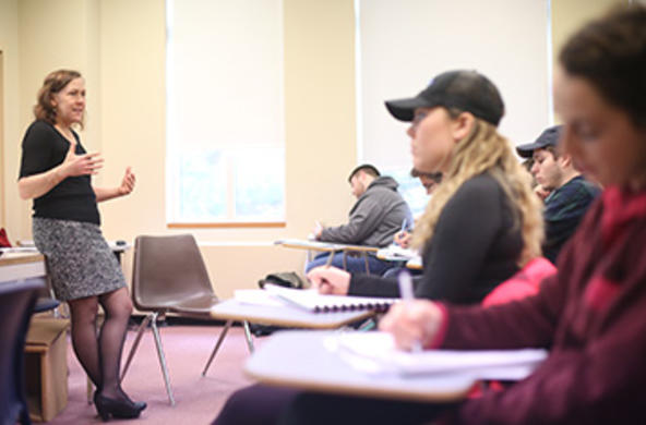 students and a professor in a class