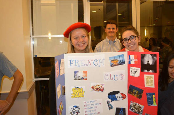 three students at Cocurricular Extravaganza 