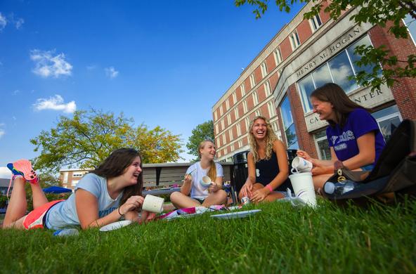 students lounging on the Hogan Courtyard