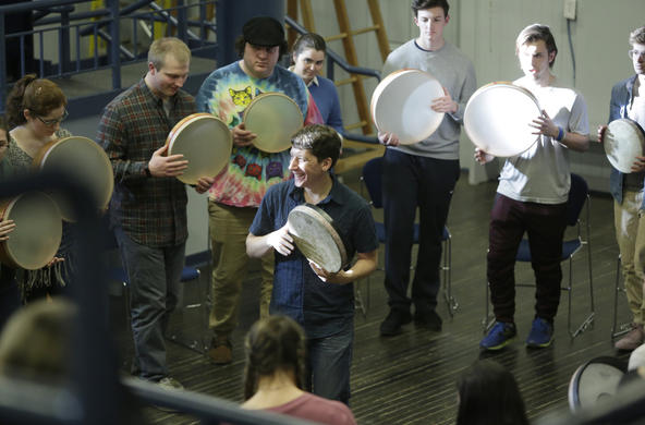 Silkroad musician Shane Shanahan leads a drum circle