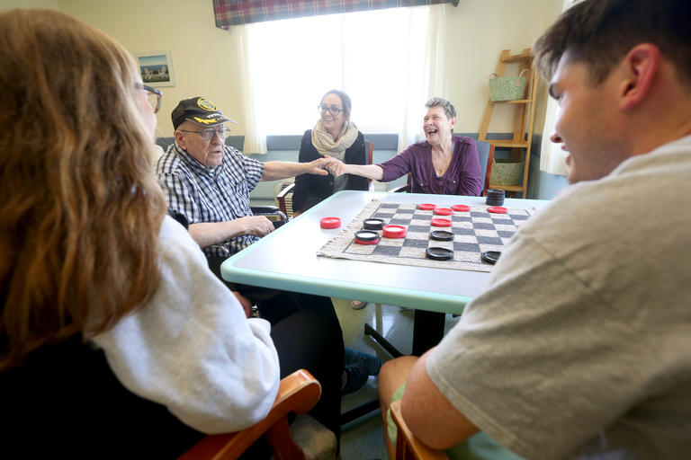 students playing checkers
