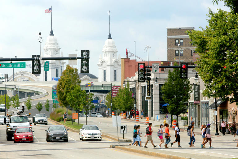 group of Holy Cross students crossing Shrewsbury Street in Worcester