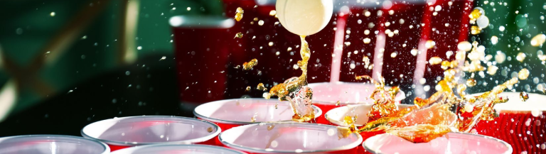 Red solo cups set up for a drinking game.