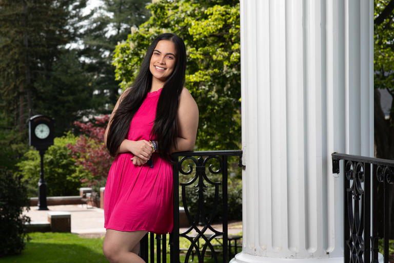 Holy Cross senior Valentina Maza poses for a photo on Fenwick porch