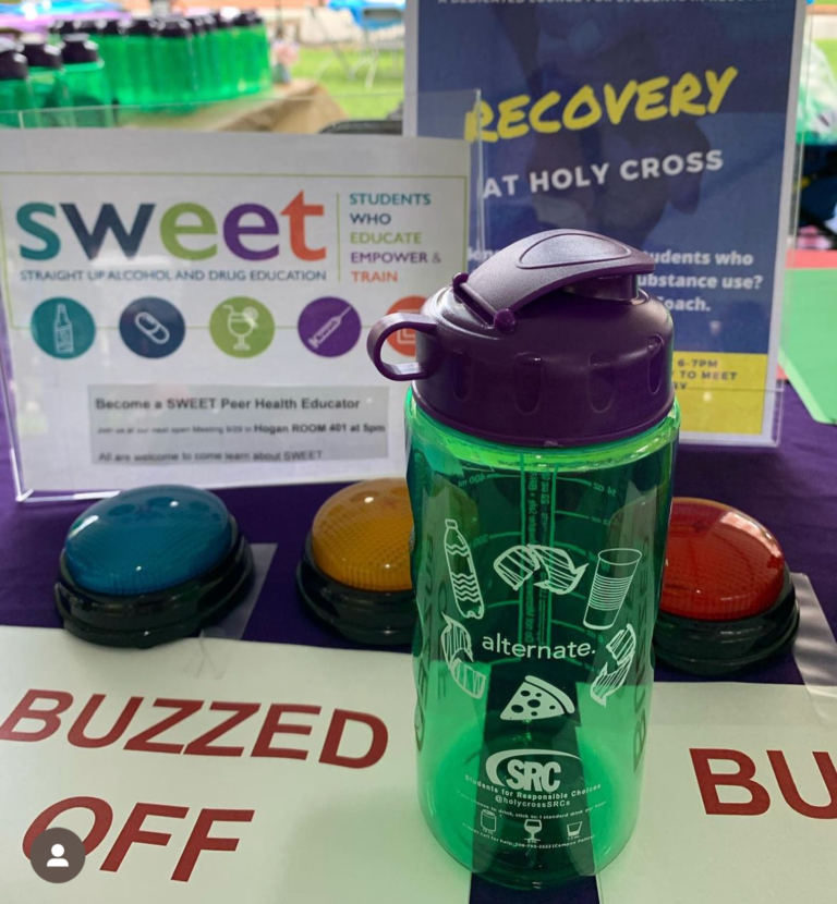 A display of SWEET and Recovery posters.