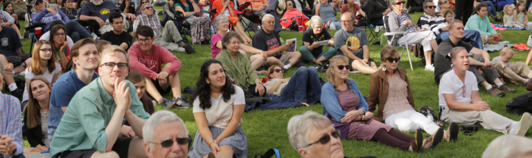 Audience watching an ATB performance at Holy Cross