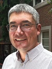 professor jim doyle close image of the professor with glasses