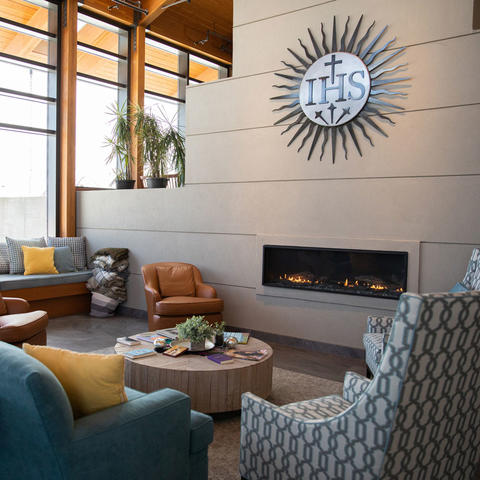 Foyer seating and fireplace at Joyce Contemplative Center.