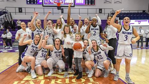 Women's basketball team celebrating