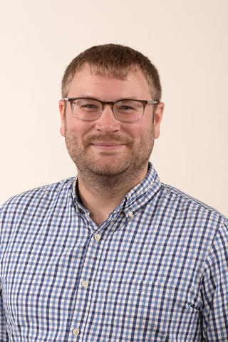 A headshot of Professor Patrick Whitmarsh